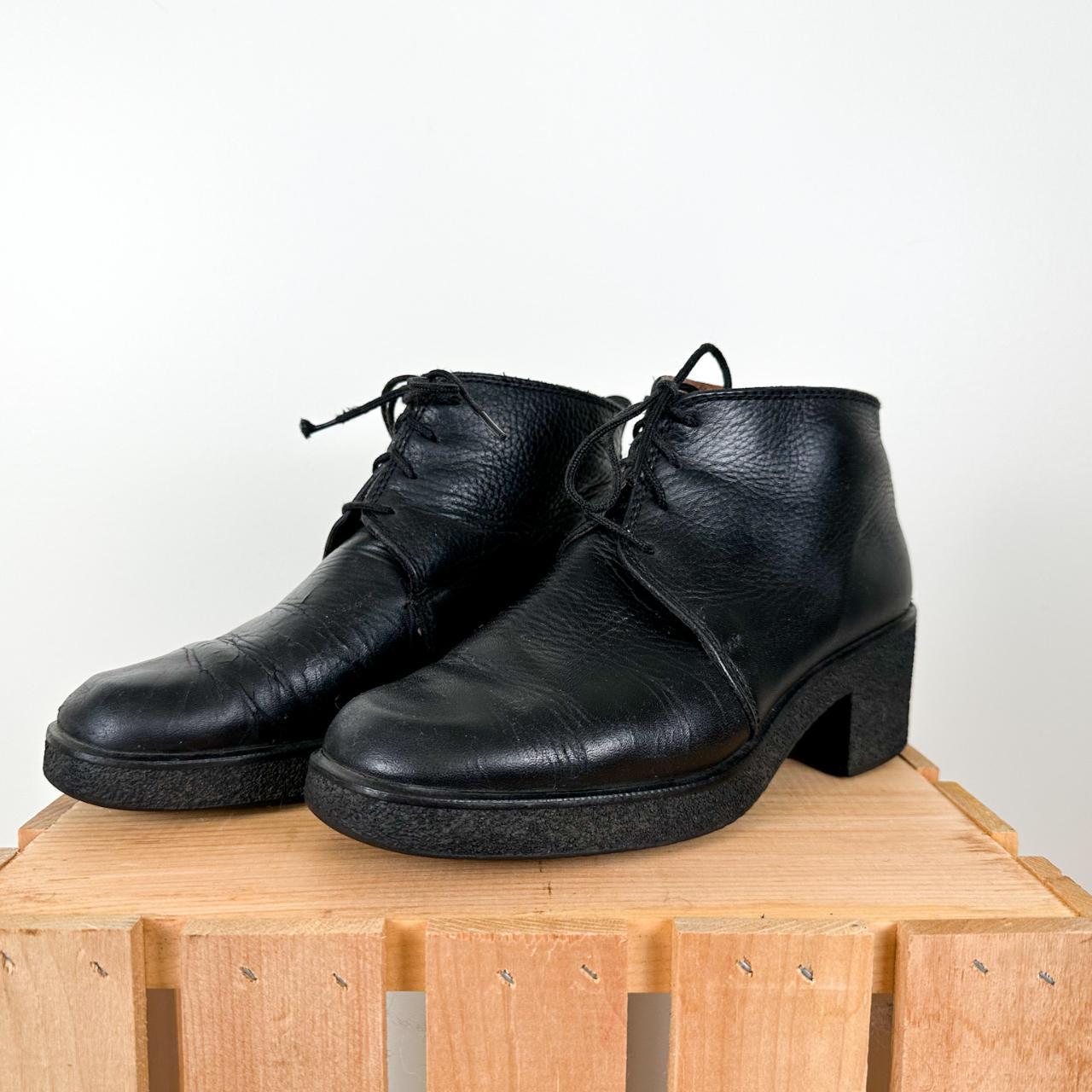 black booties with brown sole