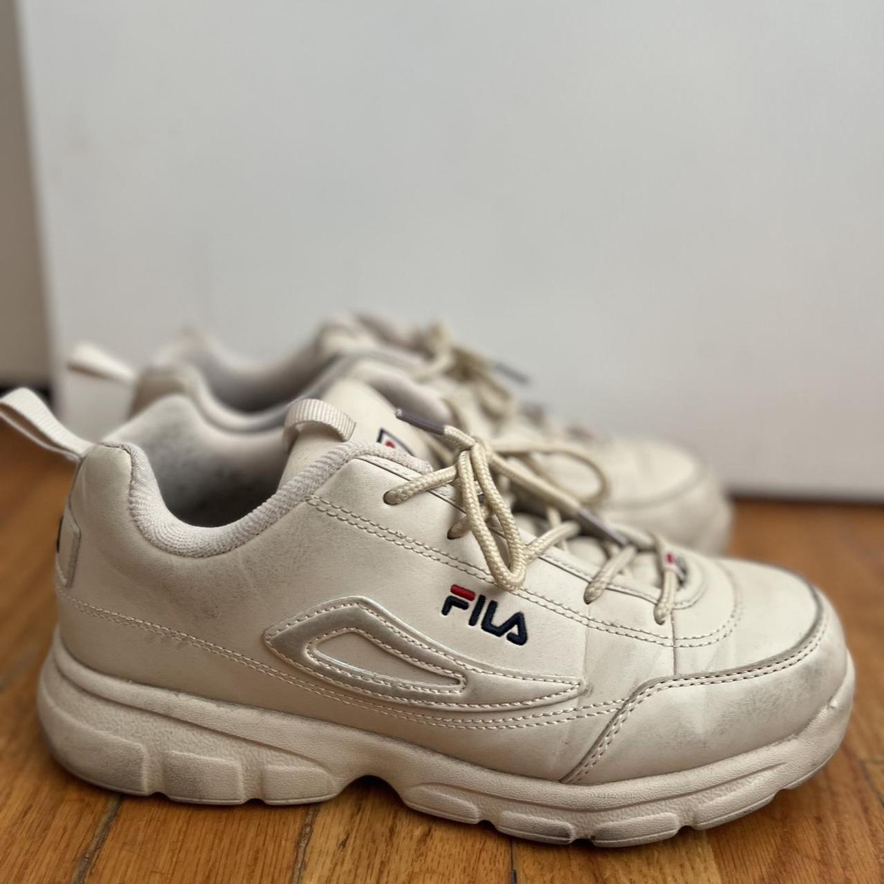 TAN SNEAKERS tan fila disrupters size 7. Depop