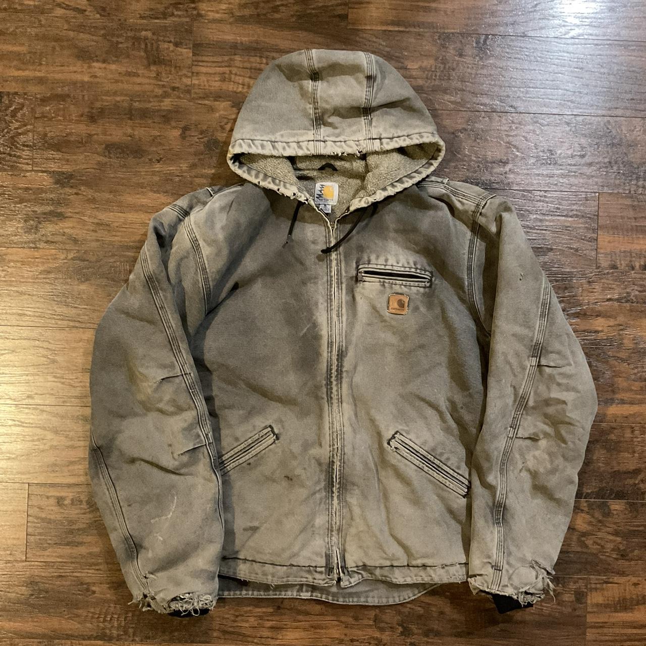 Y2K Carhartt Jacket with thrashed sleeves the zipper... - Depop