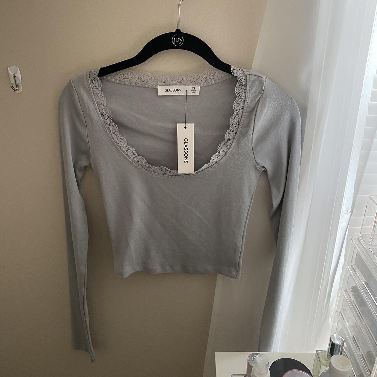 Glassons light grey cropped long sleeve. She’s cute... Depop
