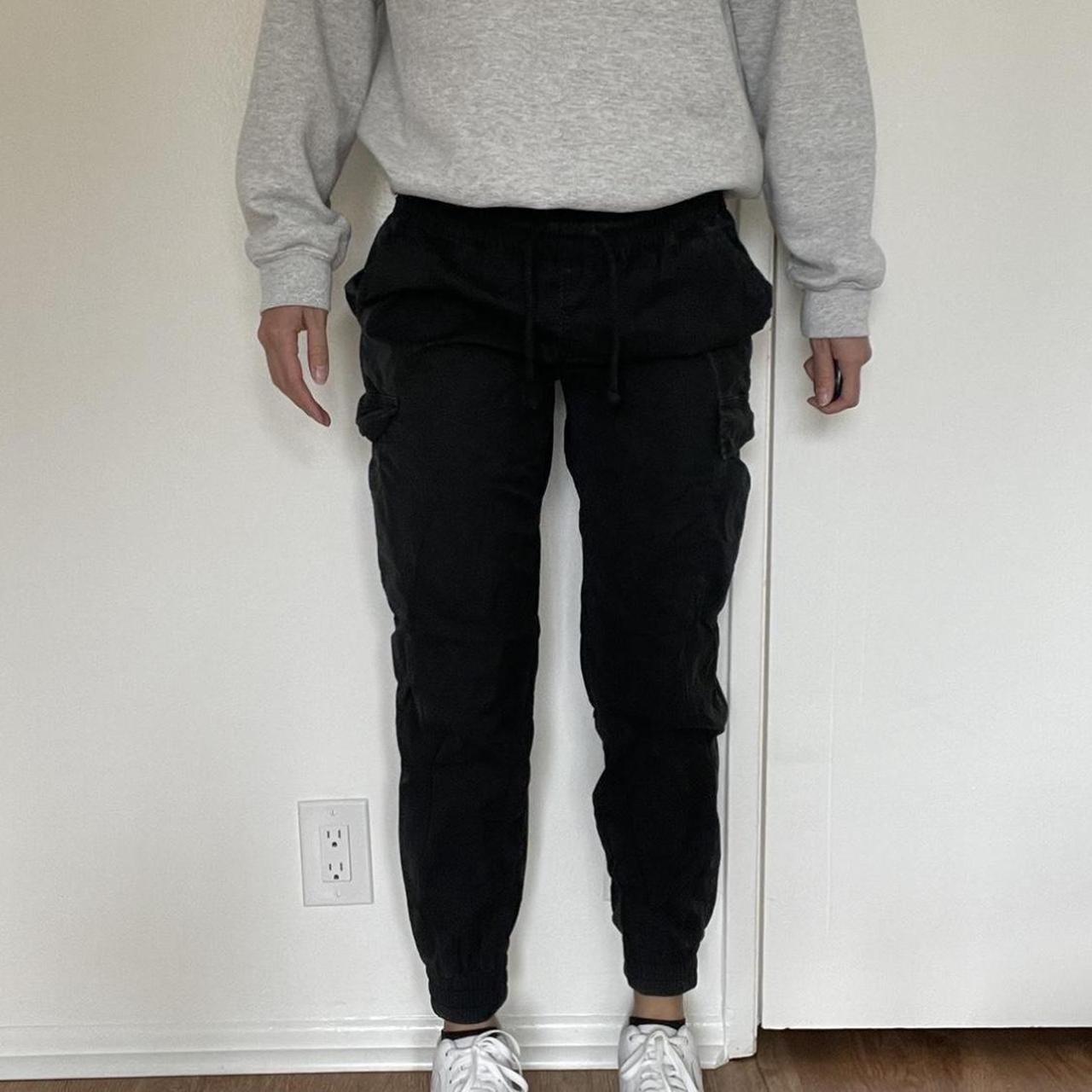 Aritzia/TNA charcoal grey cargo pants. Tapered at... Depop