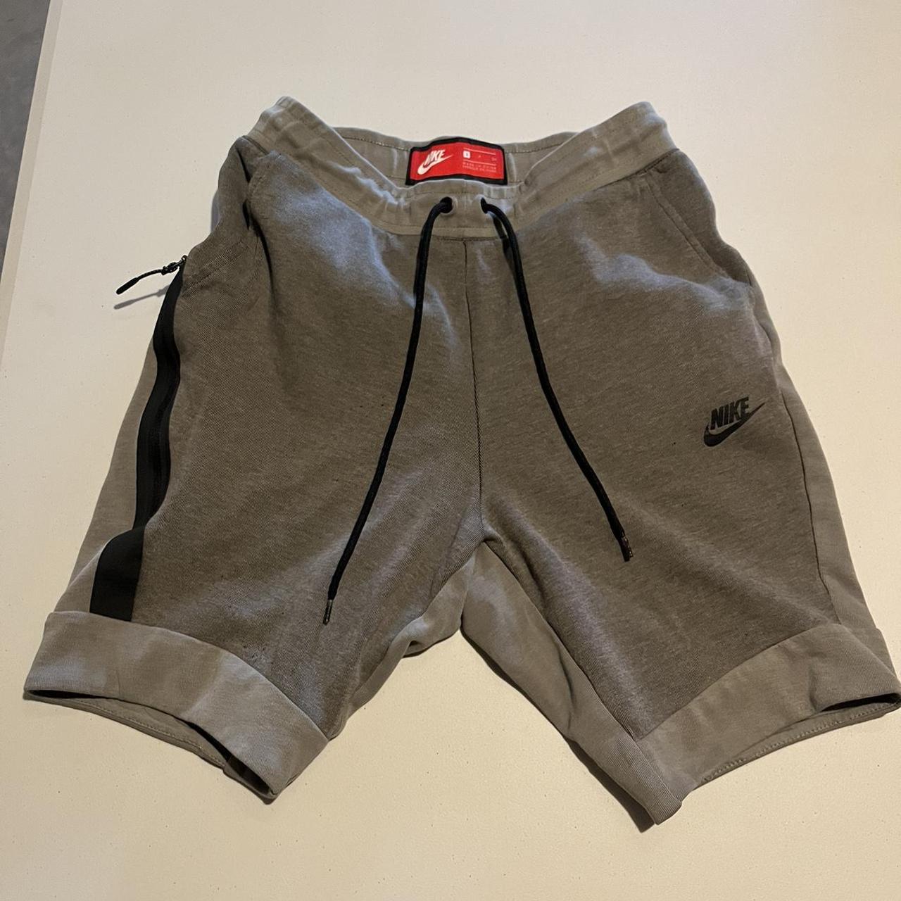 Nike tech fleece shorts size small. Green shorts... - Depop