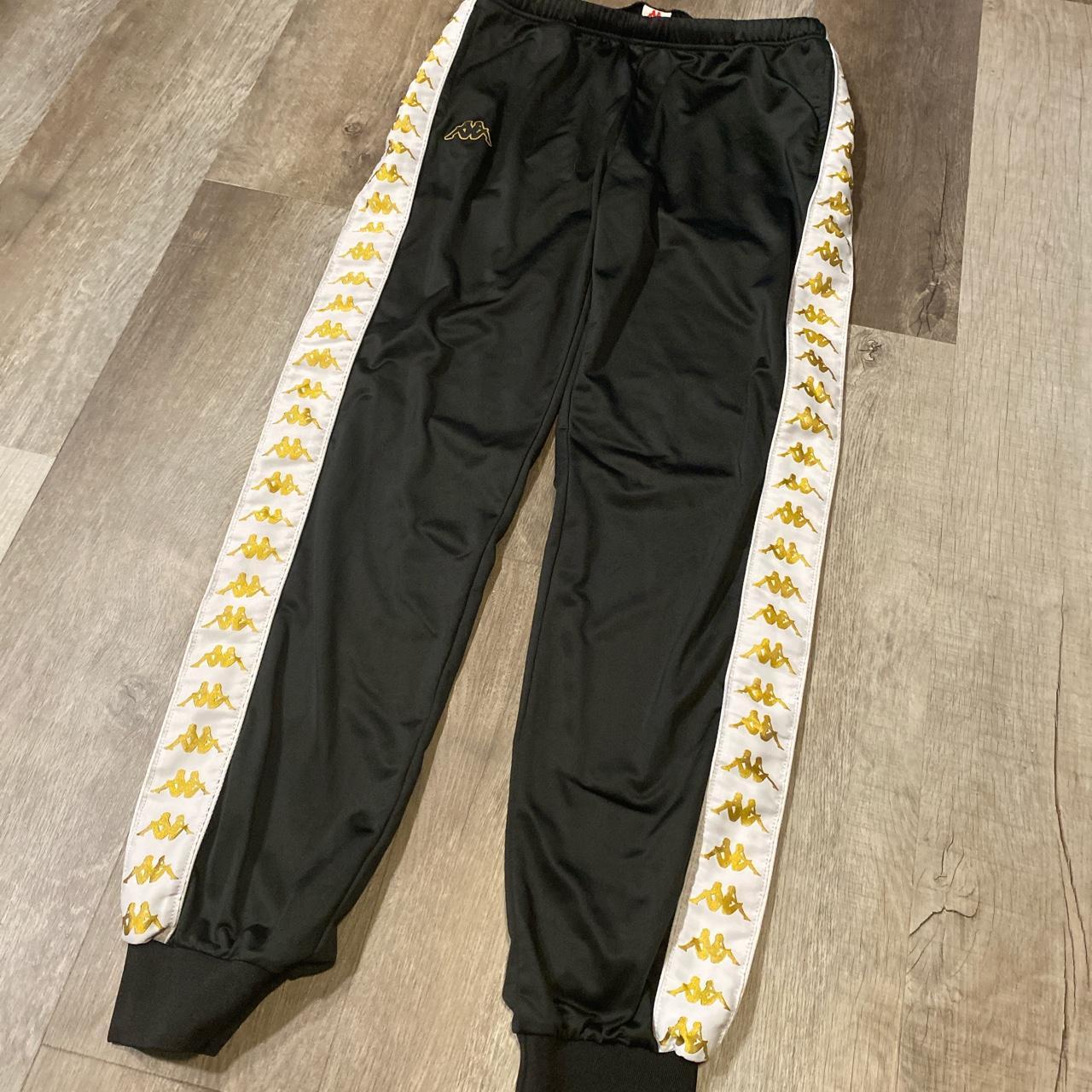 Kappa black and gold sweatpants Tagged... - Depop