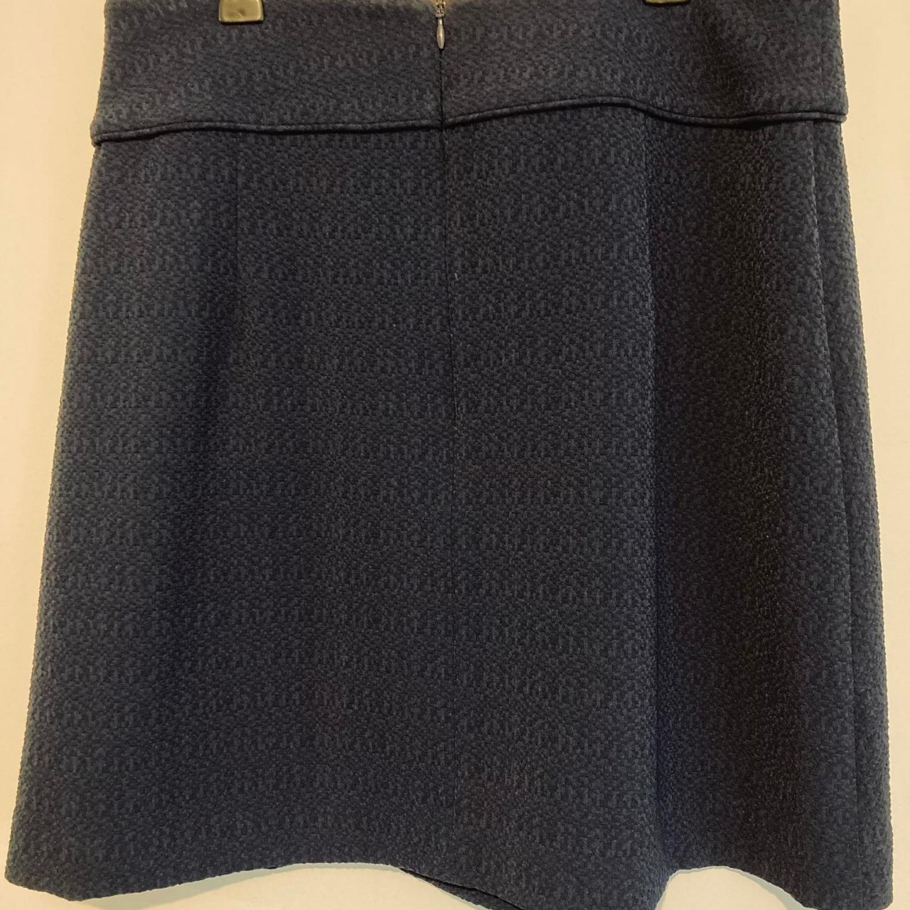 Review navy skirt bow on the front waist band - Depop