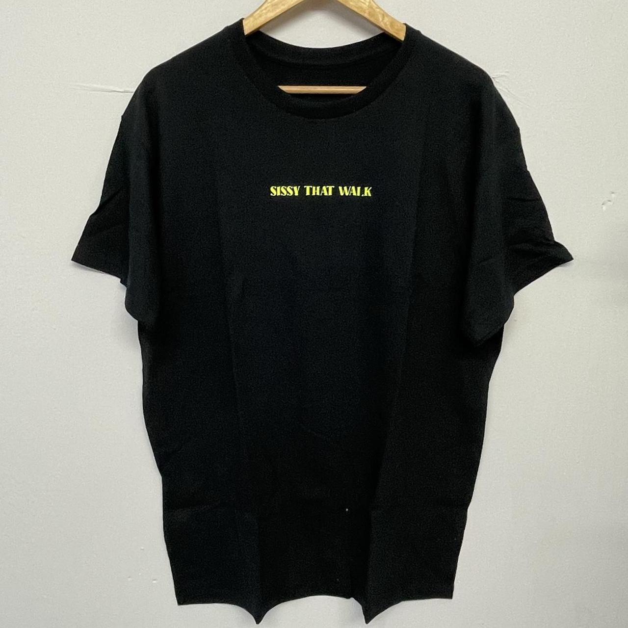 Plain black T-shirt with yellow text Size is small... - Depop