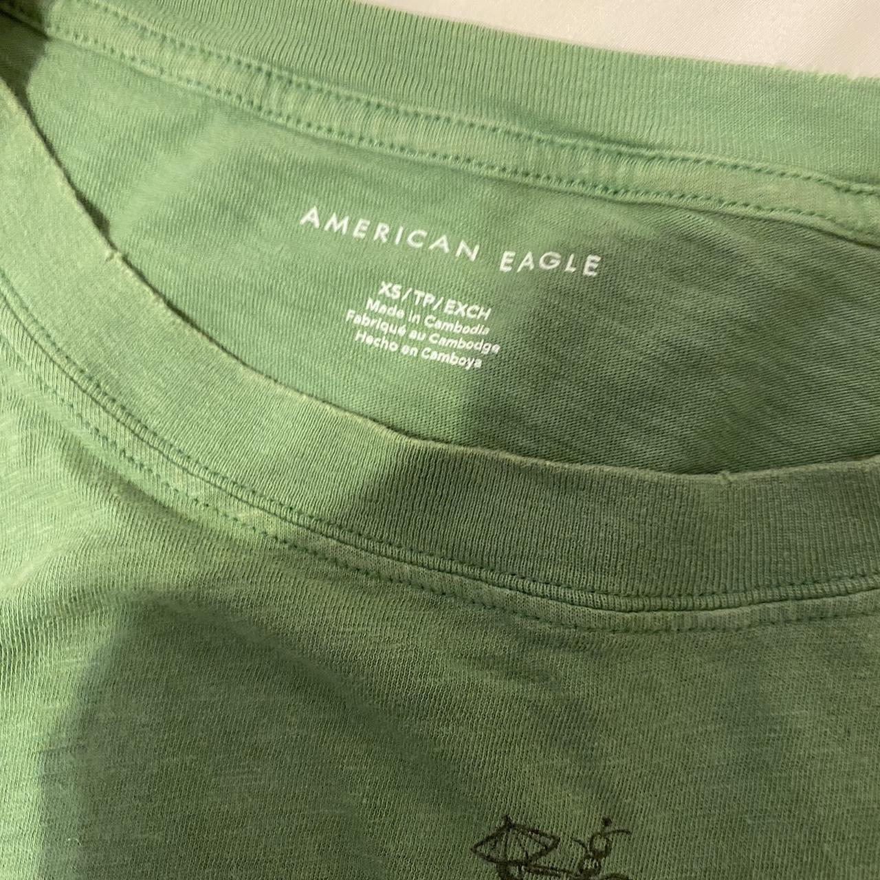 american eagle green skull shirt says XS but its... - Depop