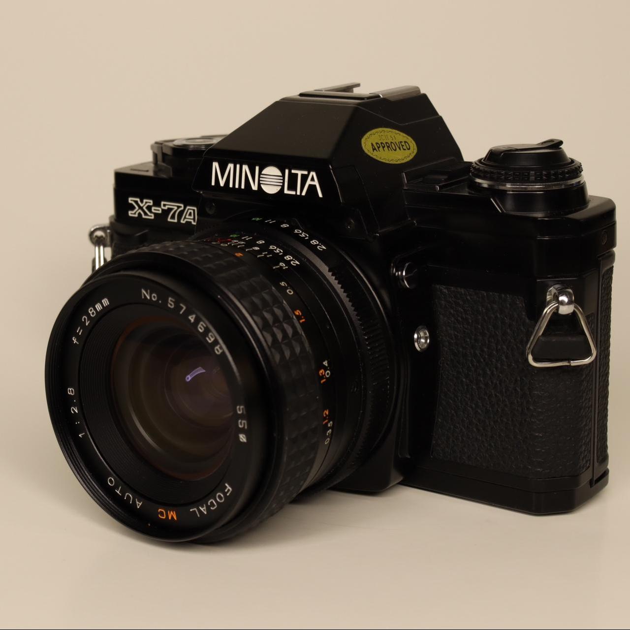 Minolta X7A with 28mm MC lens. Film tested,... Depop