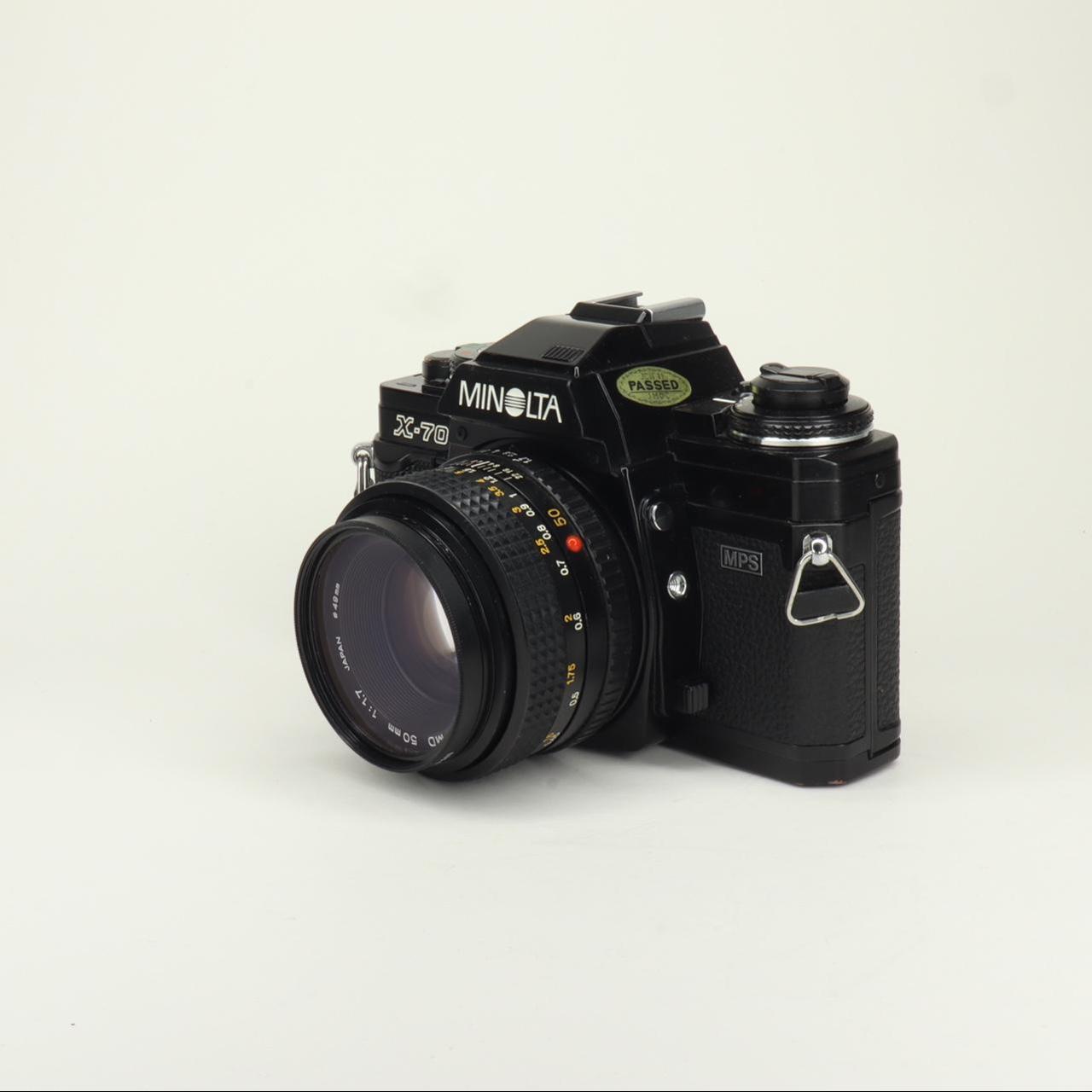 Minolta X700. Shutter speeds tested and accurate.... Depop