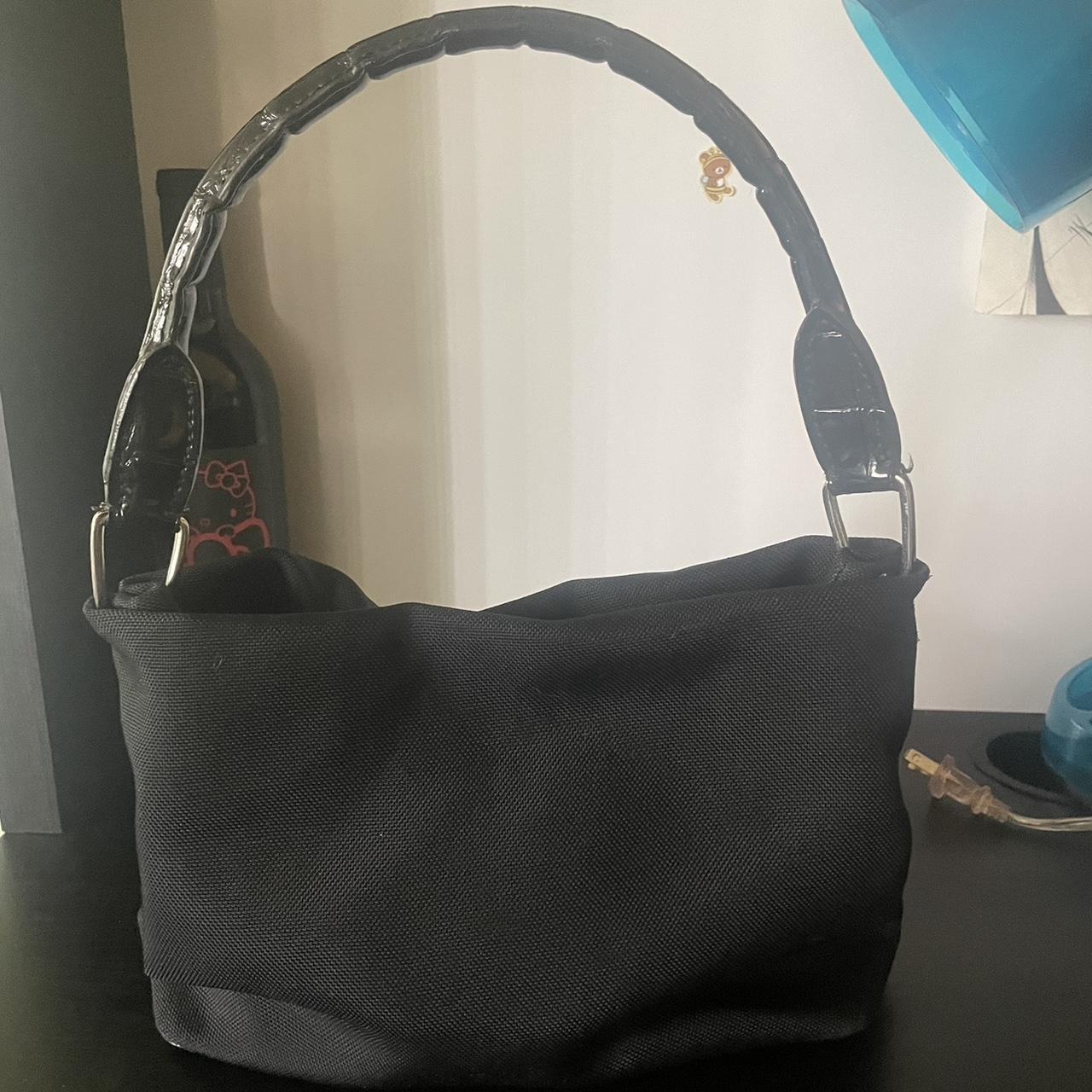 cute black DKNY bag ☆used a couple of times... Depop