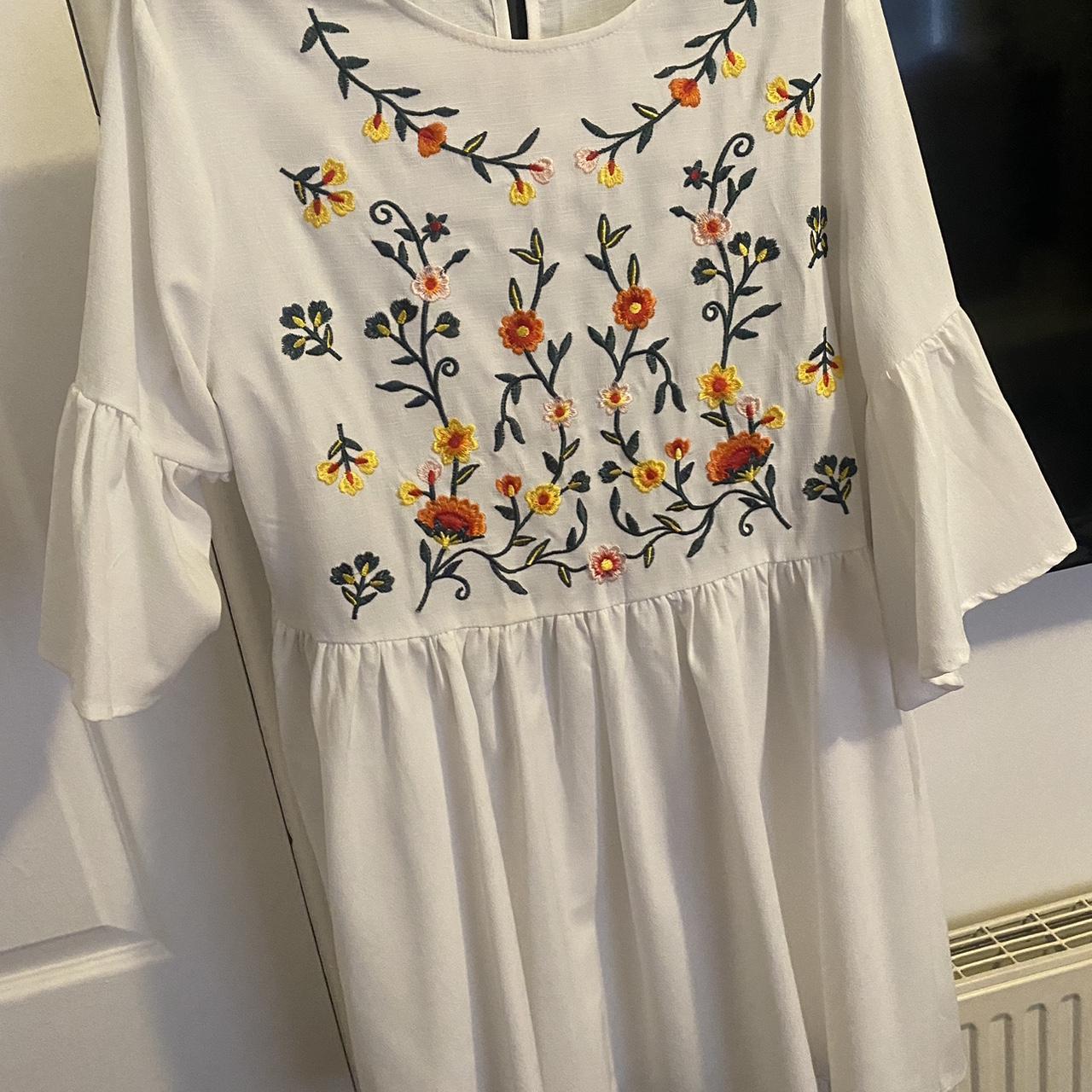 White floral smock dress size M Runs big will fit... - Depop