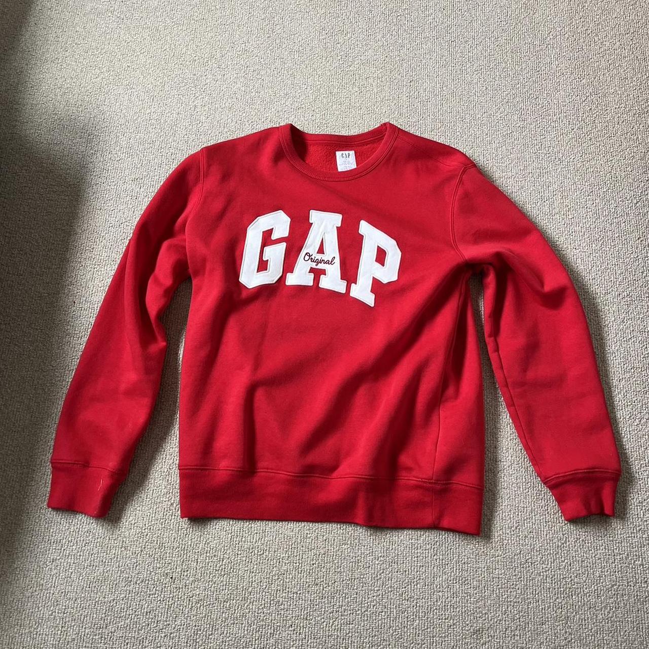 Red gap jumper with white print Perfect quality. Depop