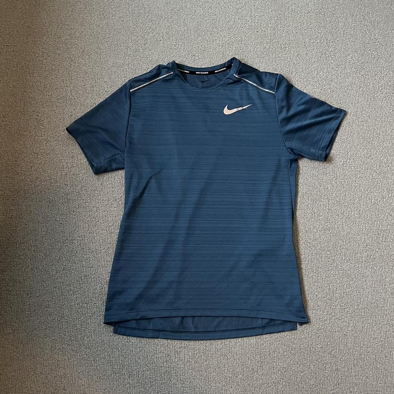 Nike miler dri fit top in Depop