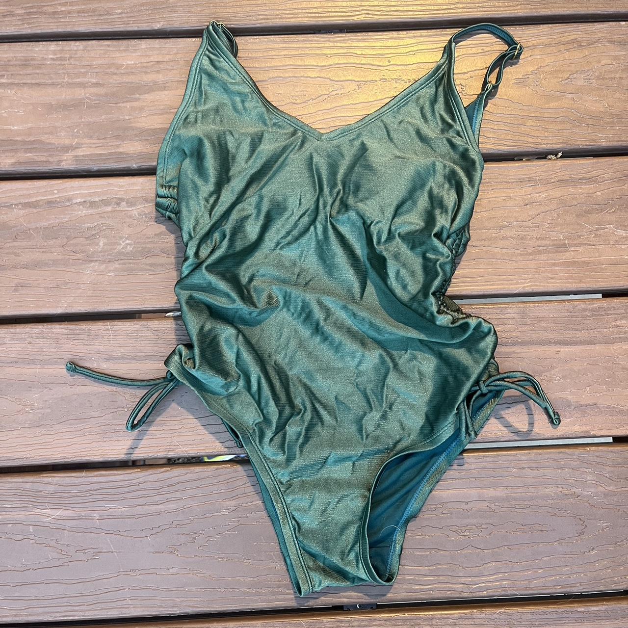 Beautiful emerald green one piece bathing... Depop