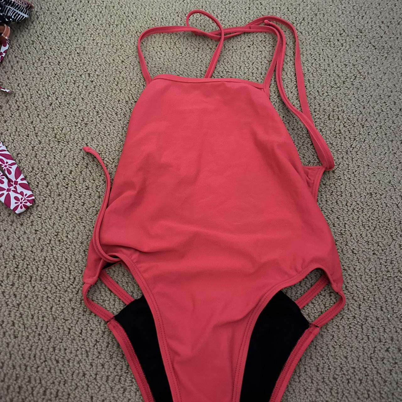 Jolyn Swim Suit. Pinkish Orange color. Tie back.... Depop