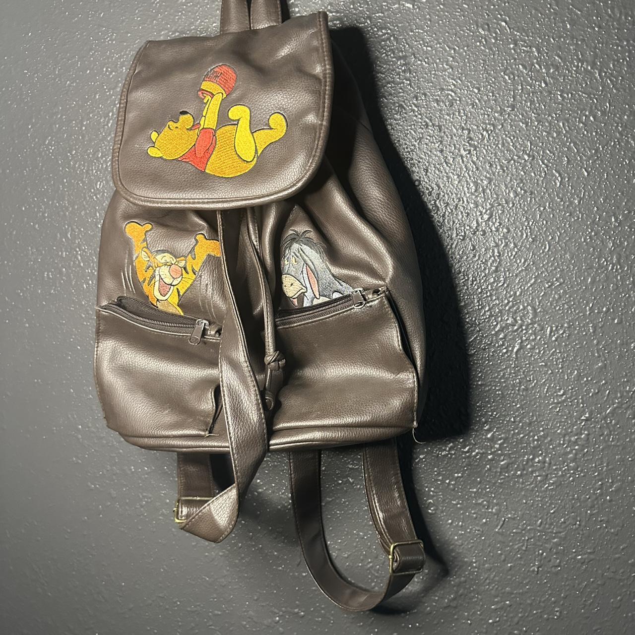 Brown Winnie the Pooh backpack with leather... | Depop