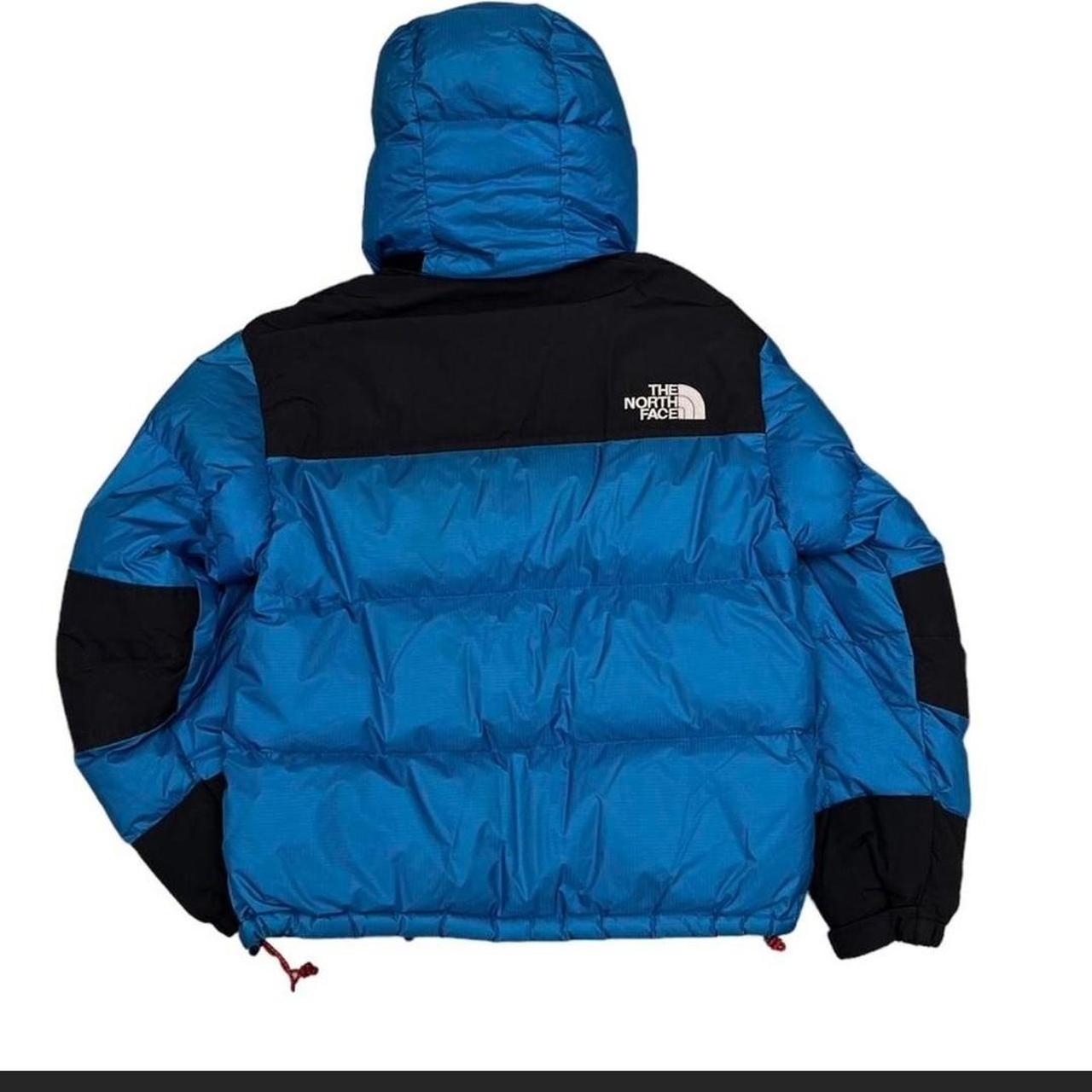 The north face puffer black and light blue Baltoro... - Depop