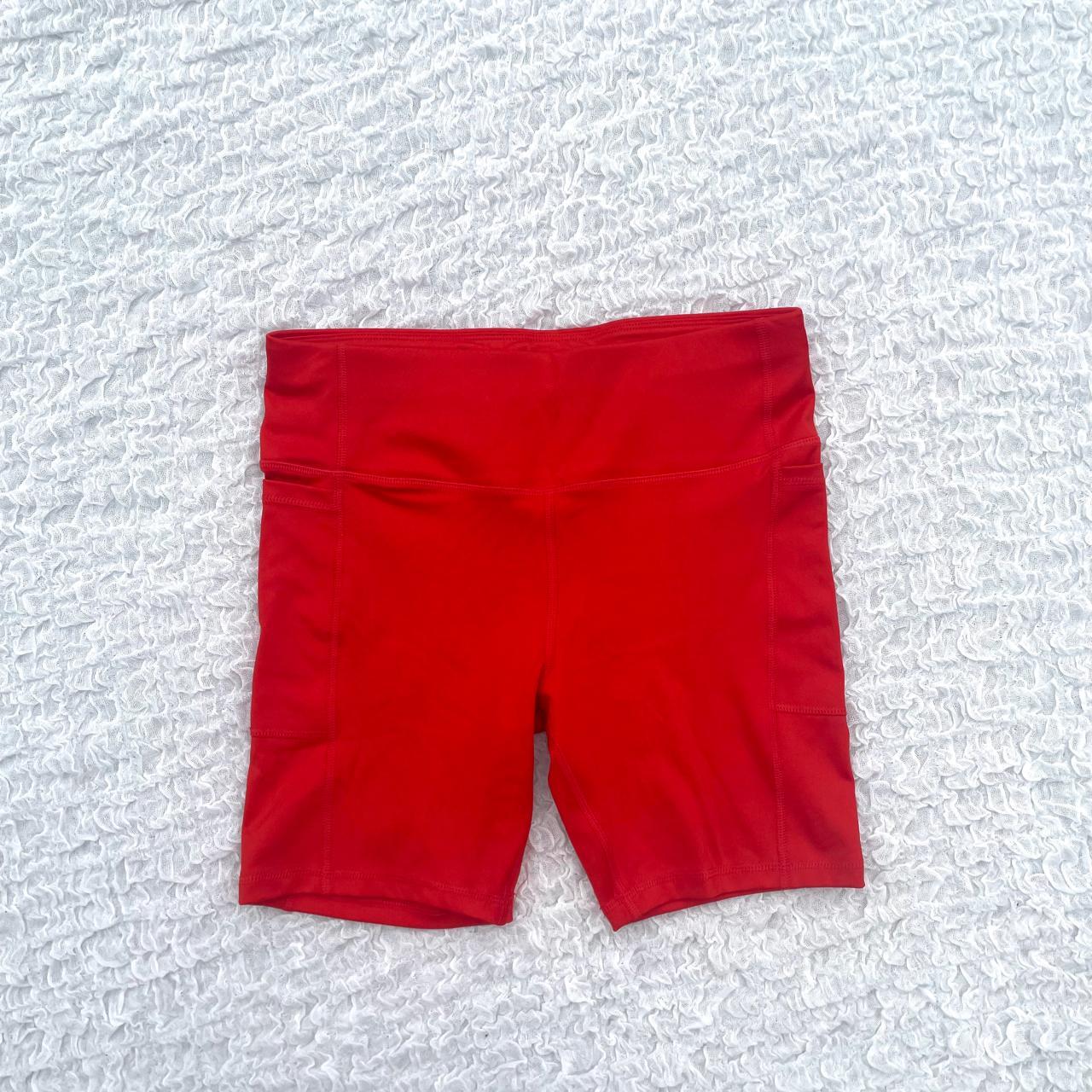 - orange biker shorts - side pockets - small pocket... - Depop