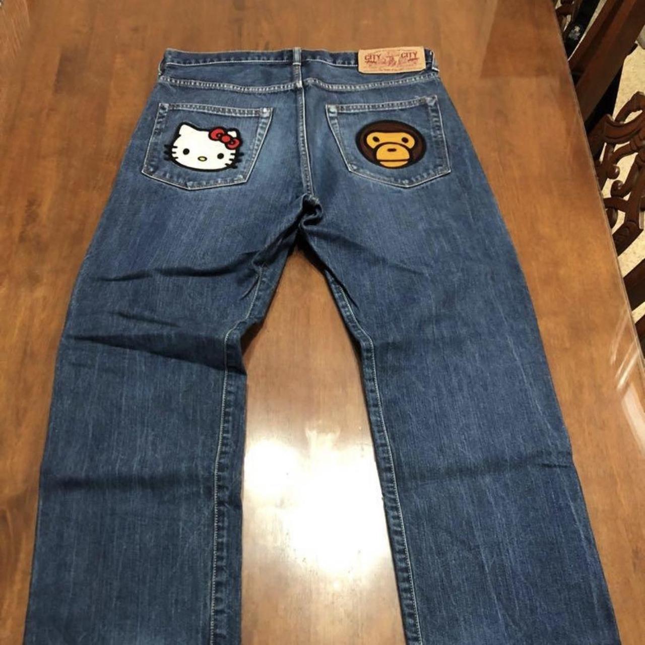 Hello Kitty Women's Blue and Pink Jeans Depop