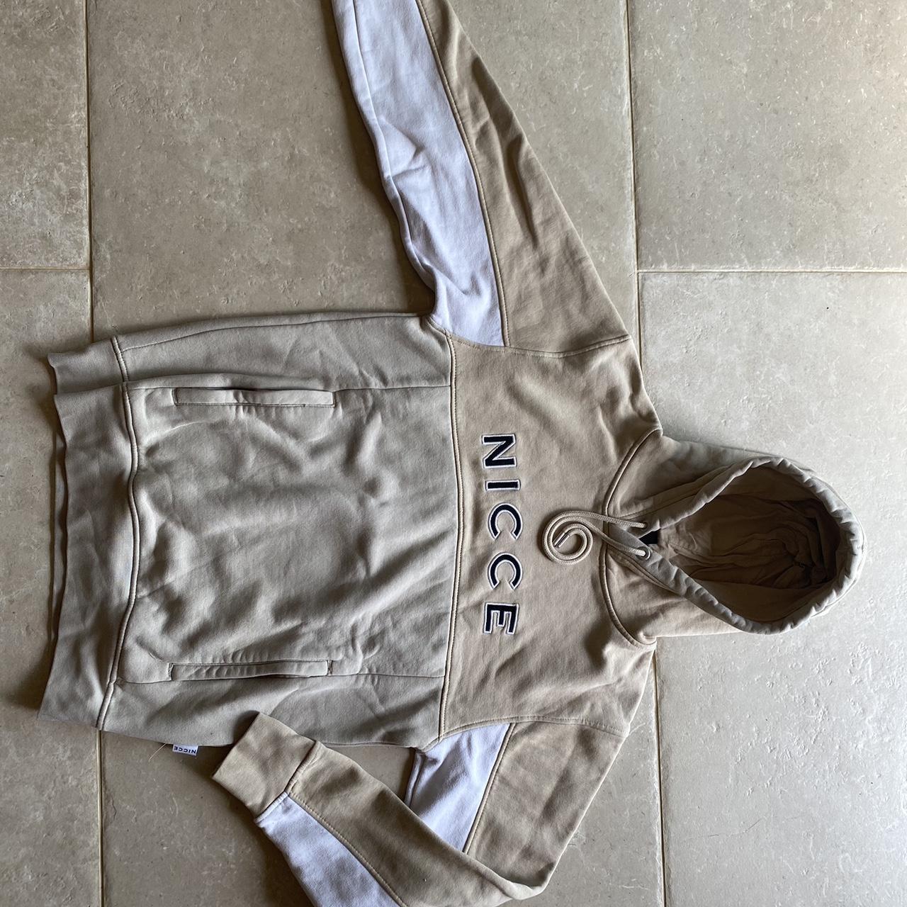 XS beige tan and white Nicce hoodie with zip up. Depop