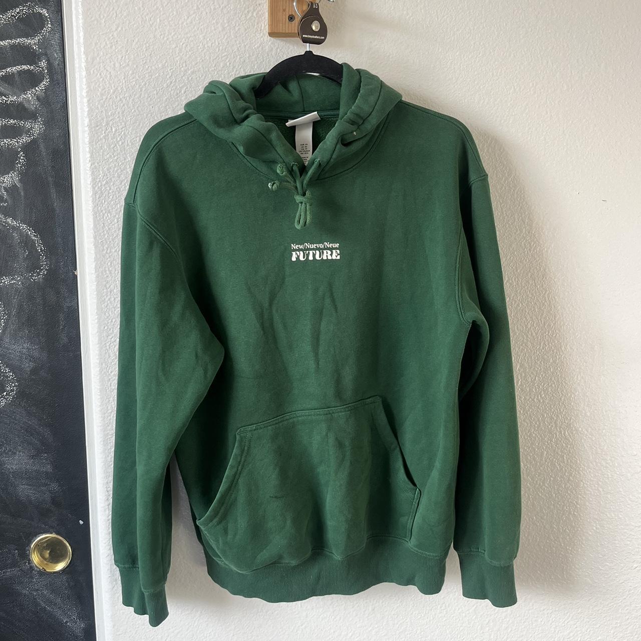Dark green graphic hoodie, relaxed fit a few paint... Depop
