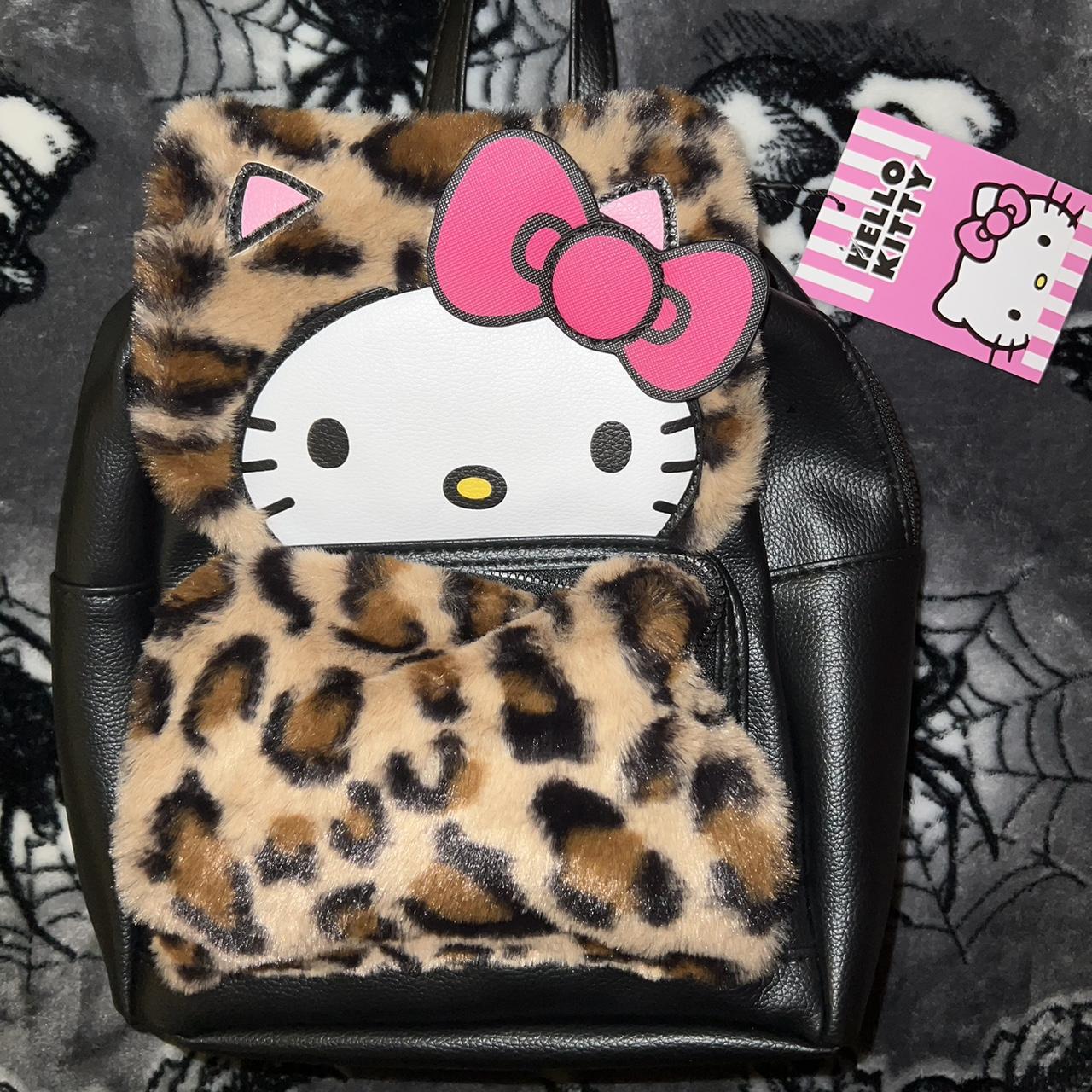 Hello kitty leopard print mini backpack 🫦 ON... - Depop