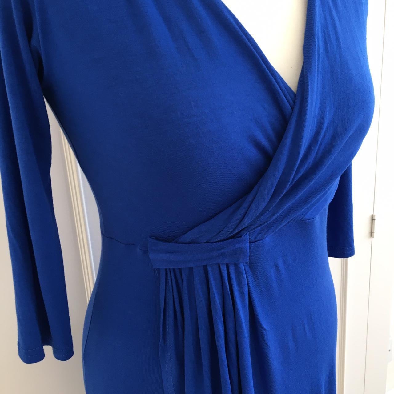 Bright blue wrap dress from Boohoo. Stretchy jersey... - Depop