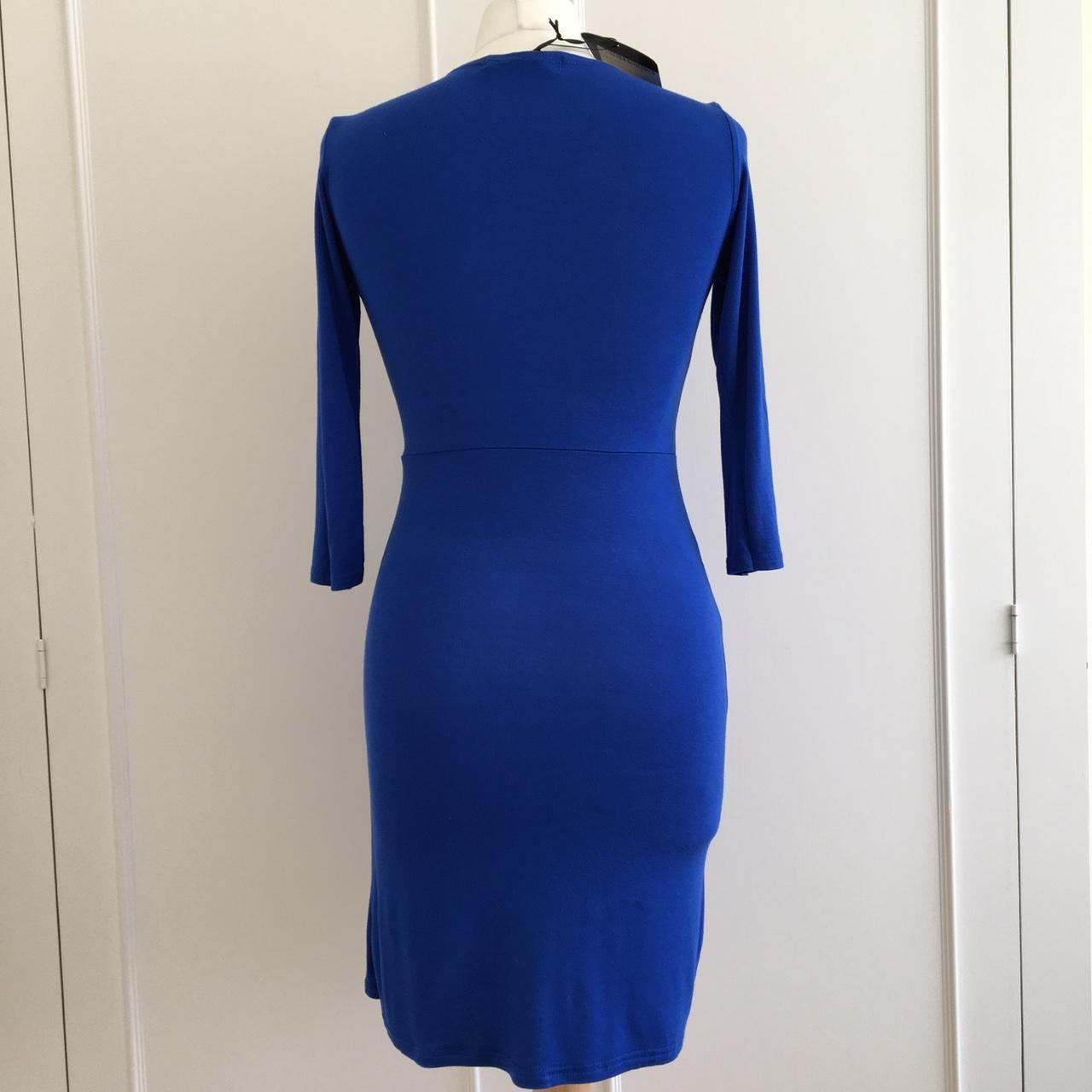Bright blue wrap dress from Boohoo. Stretchy jersey... - Depop
