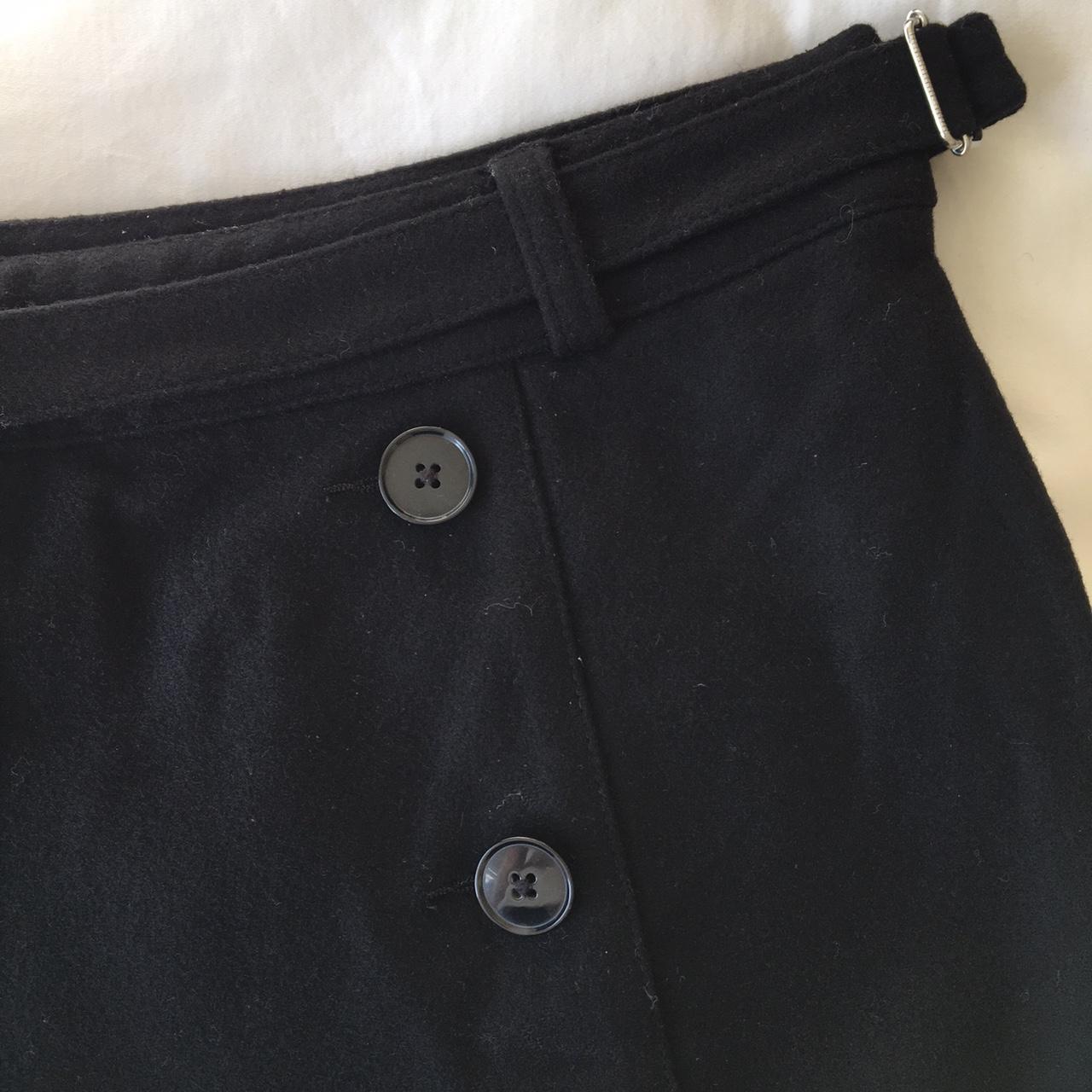 Gap black wool mini skirt. Button detail on front.... - Depop