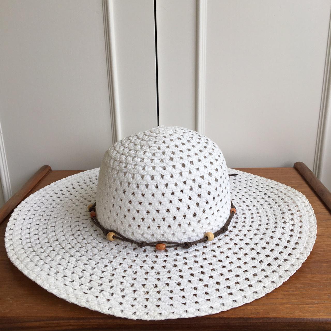 Wide brimmed floppy straw hat. Beads and tie detail.... - Depop