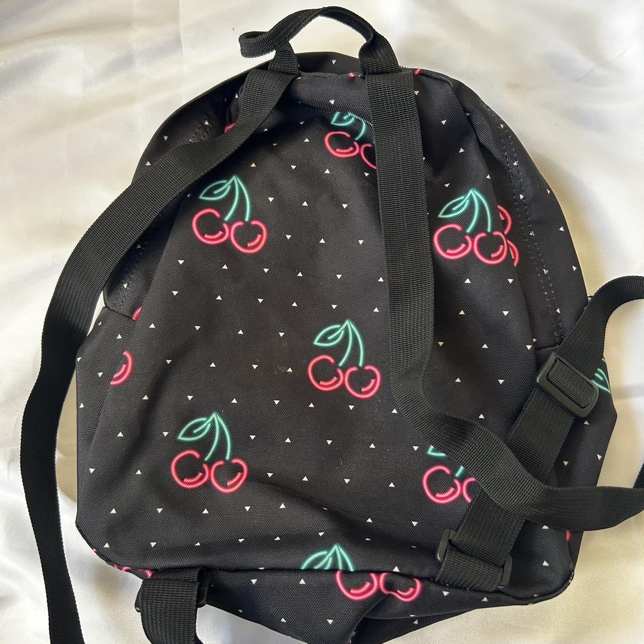 Neon top cherries jansport