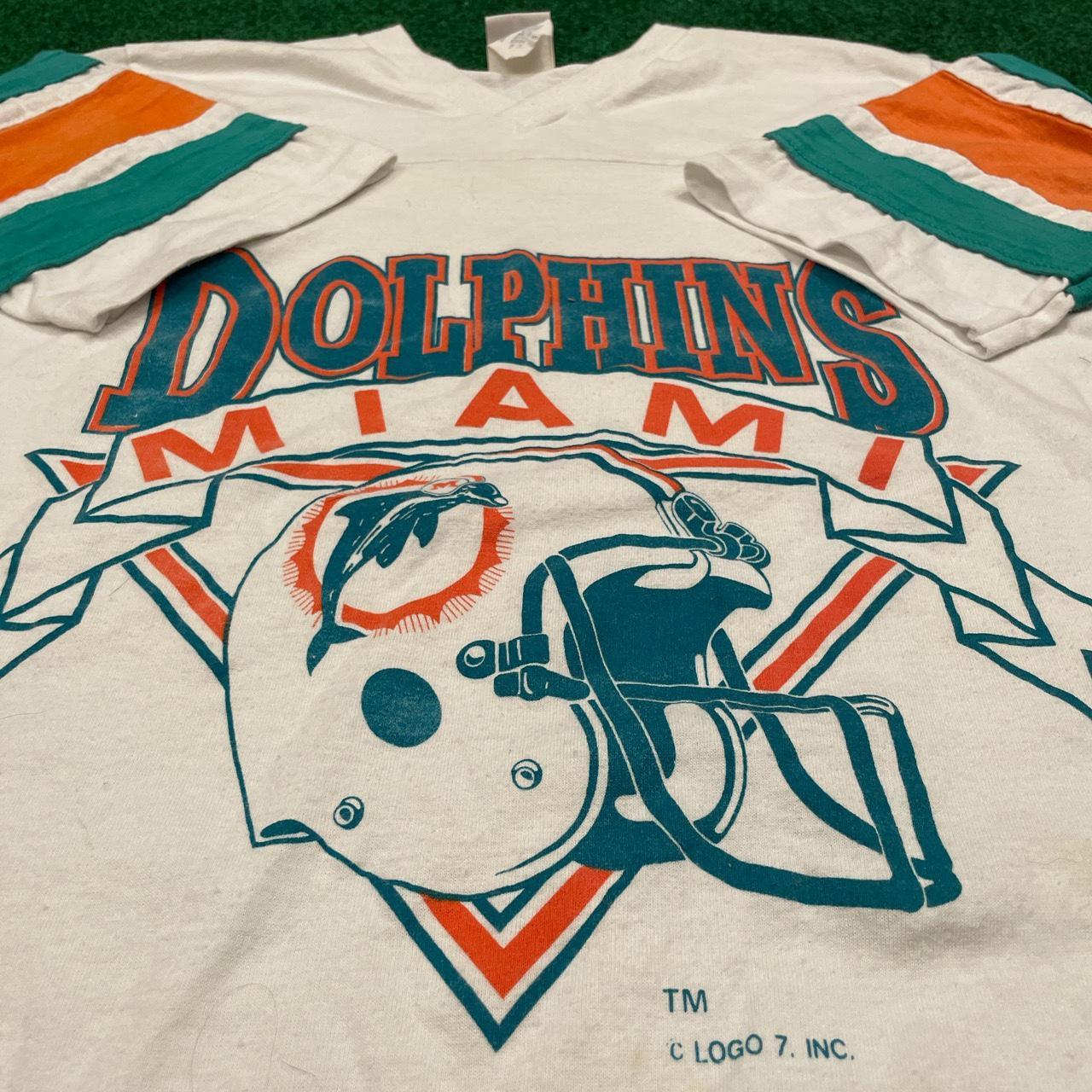 Vintage Logo 7 Miami Dolphins sweatshirt in white. - Depop