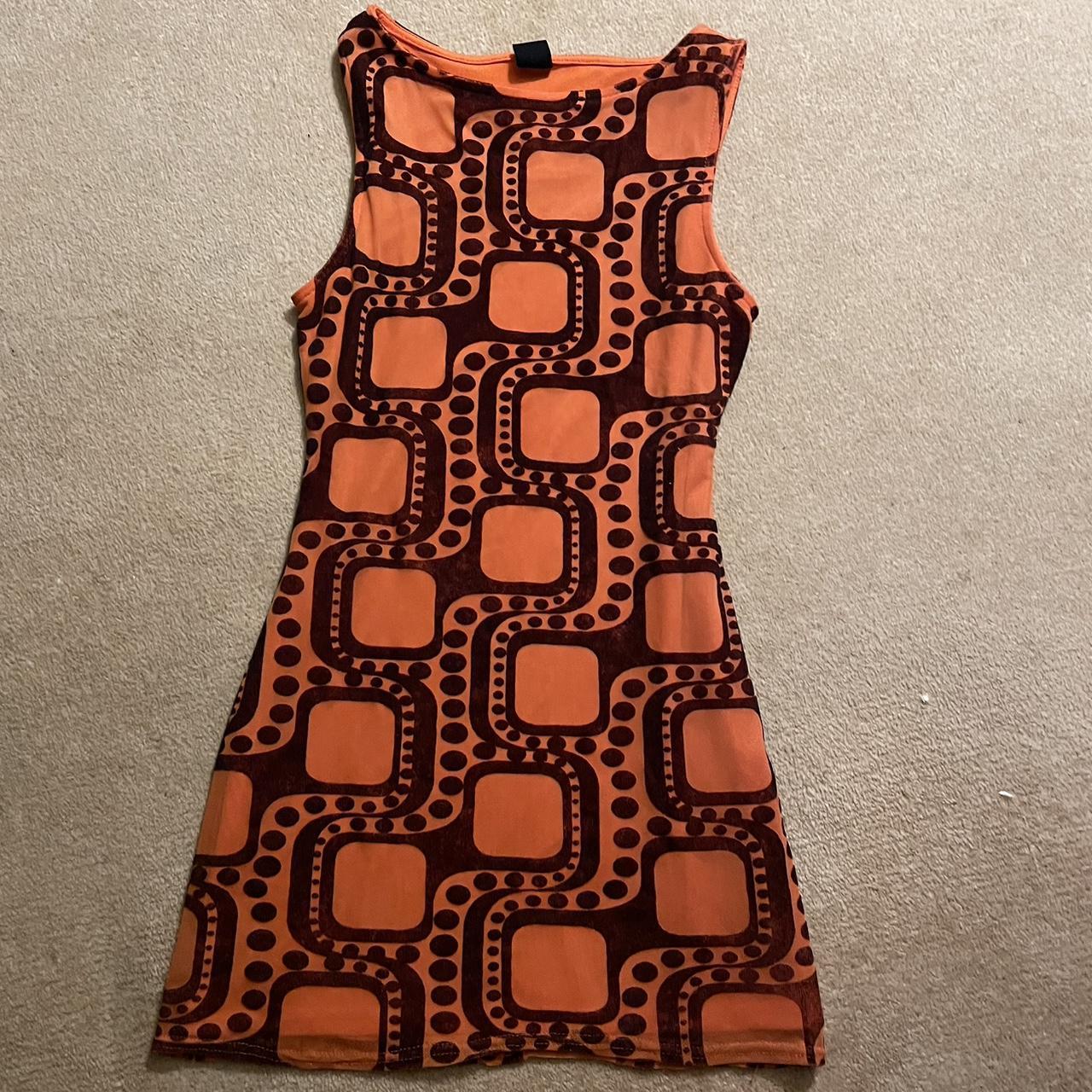 Urban Outfitters orange 70s print midi dress in size... Depop