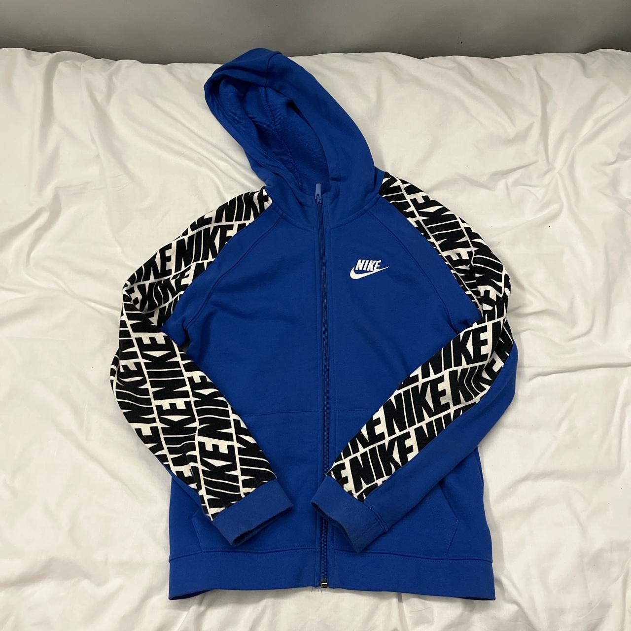 Blue Nike Jacket with Nike logo along the... - Depop