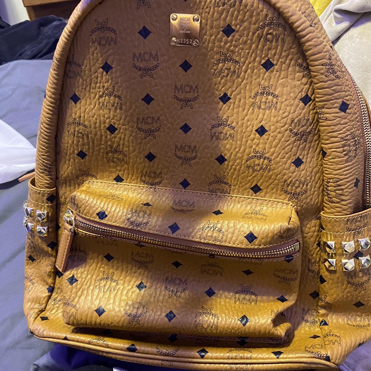 MCM BACKPACK TAN LIGHTLY USED TWO SLIGHT TEARS ON - Depop