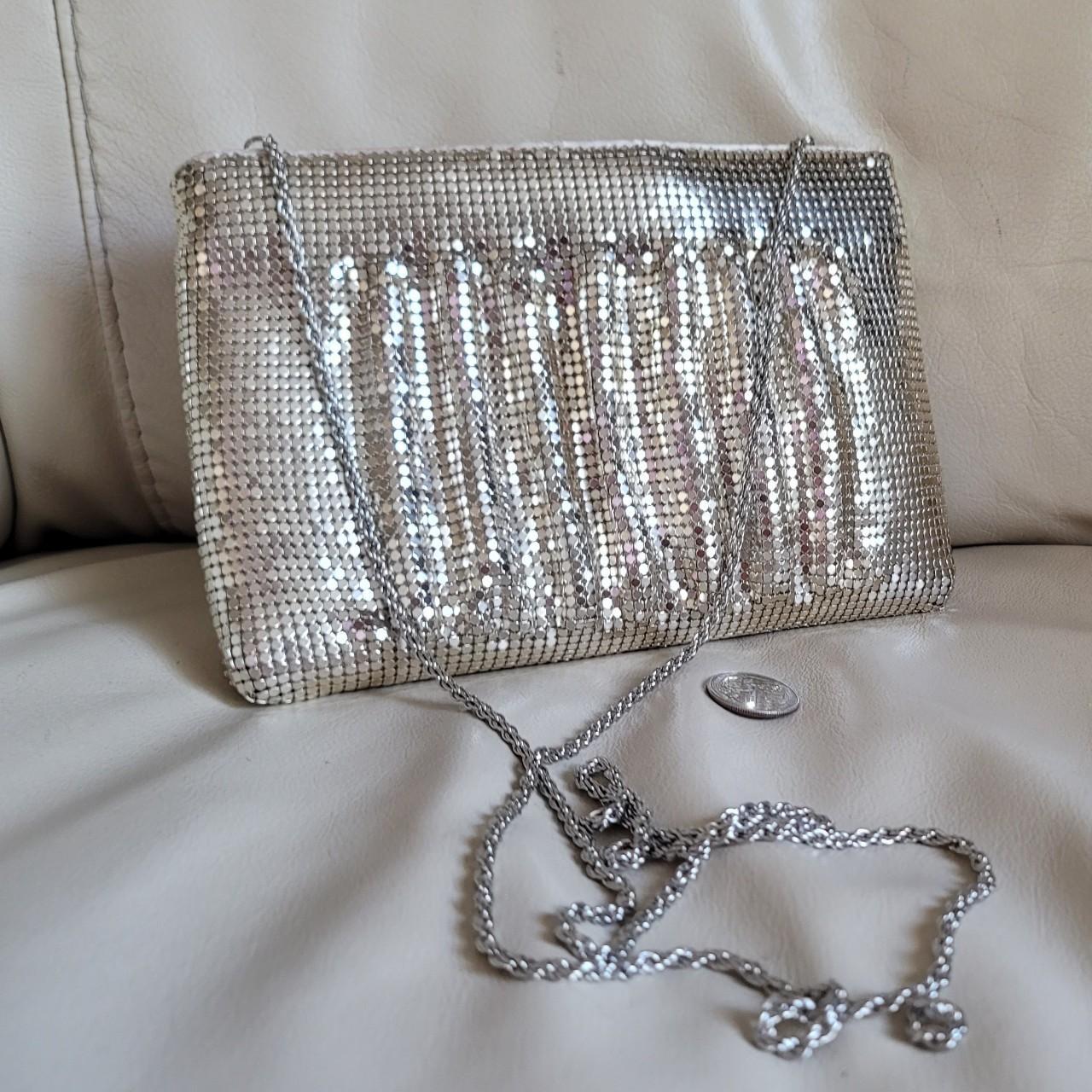 Silver formal store clutch