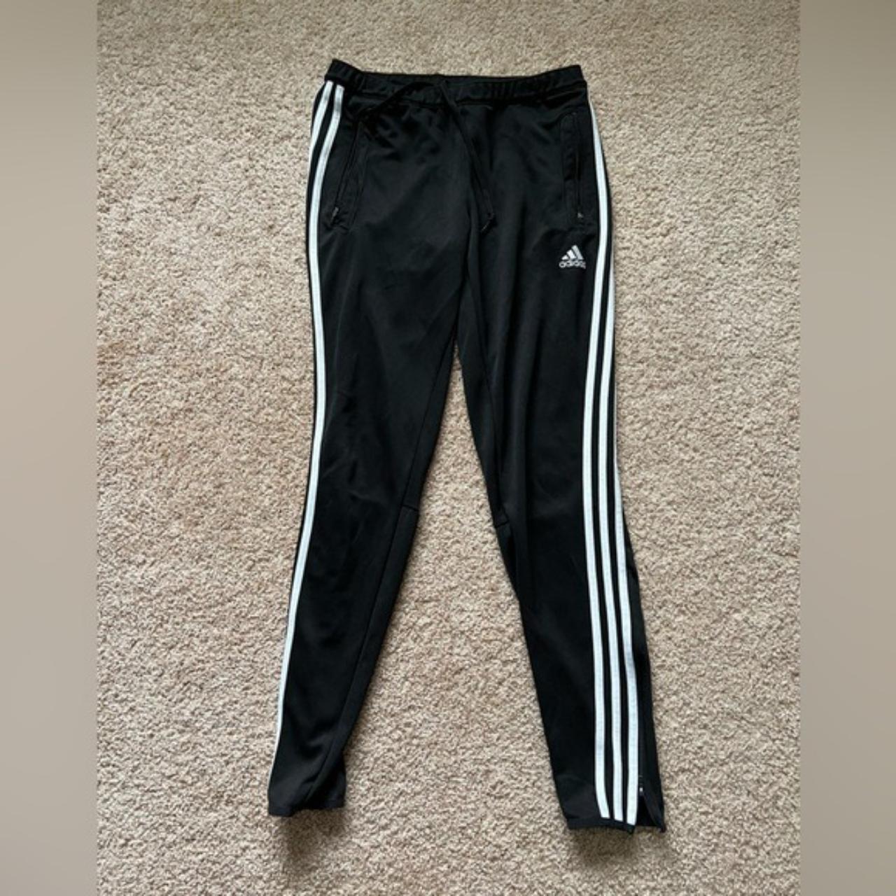 track pants with zippers at bottom ankle, worn very... - Depop