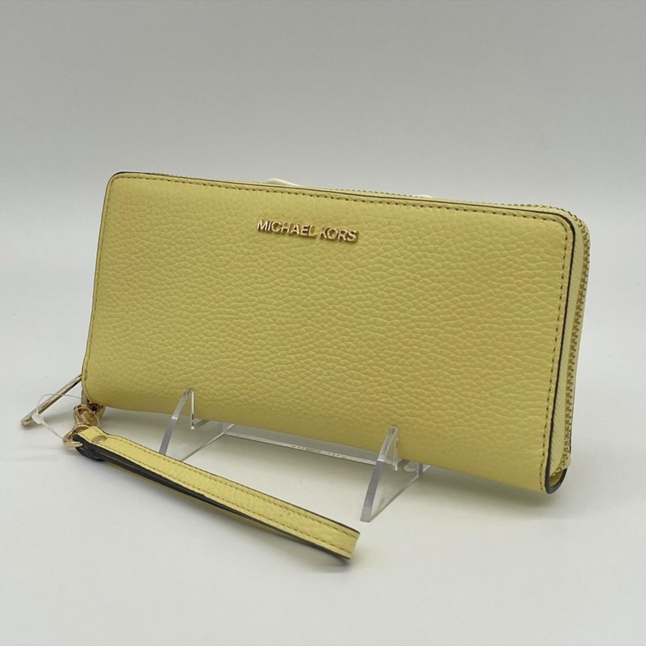 Michael Kors Women's Yellow and Gold Wallet-purses | Depop