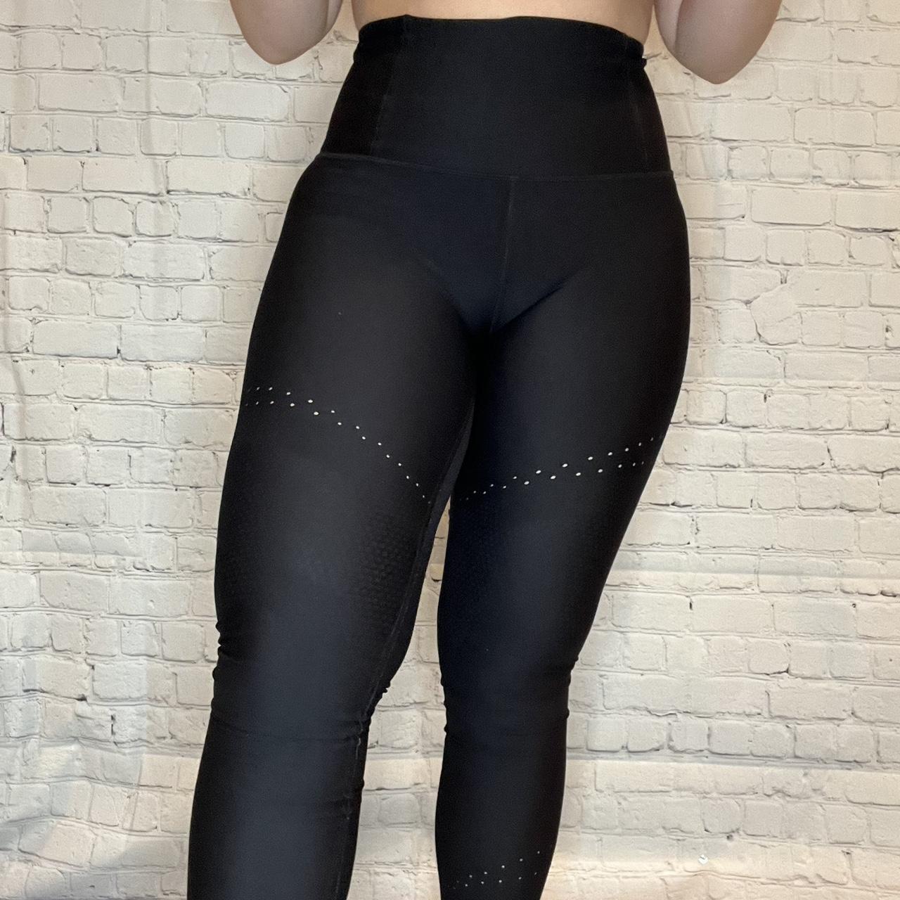 Black Lululemon leggings- has small circle cutouts - Depop