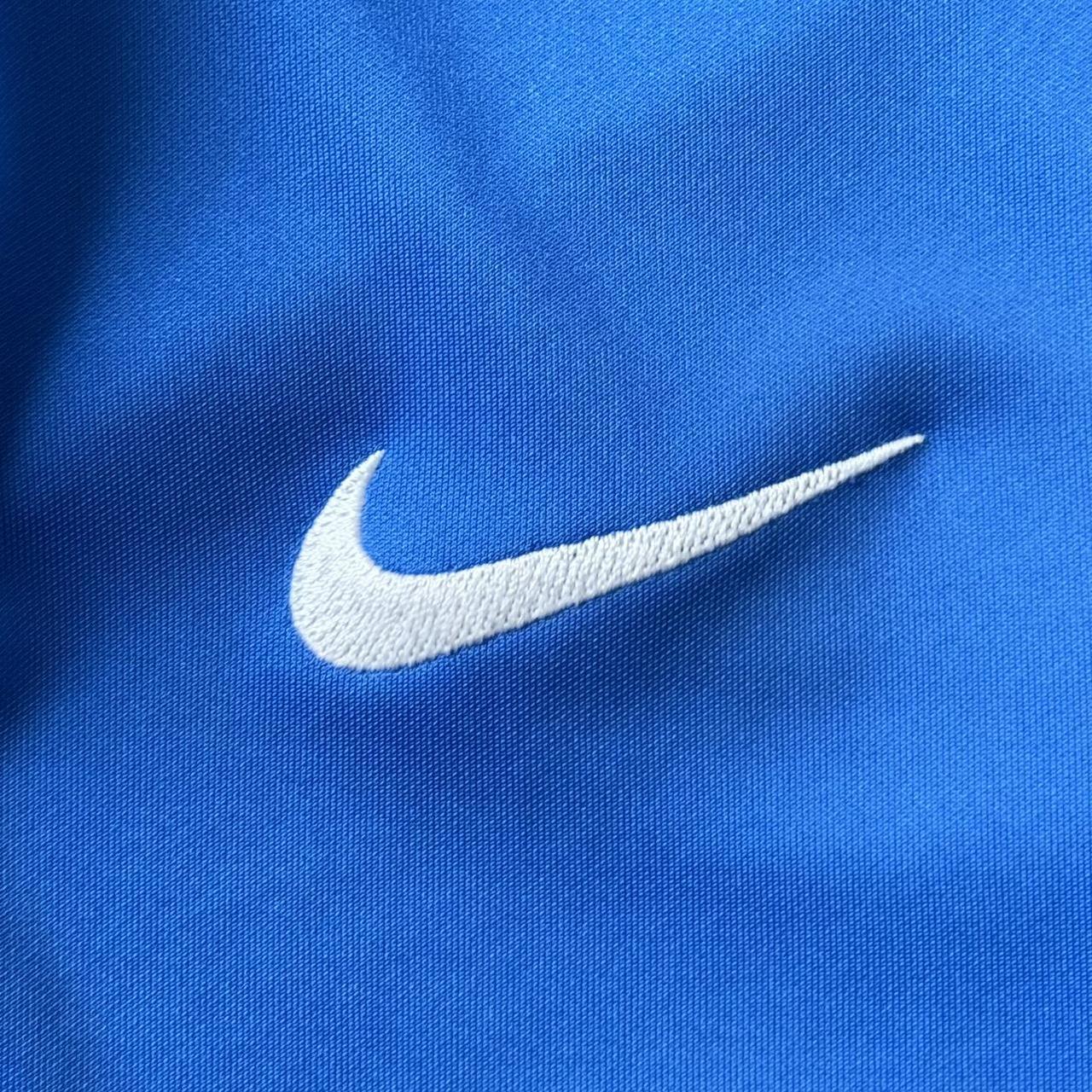 Blue Nike Dri-Fit zip-through - Depop