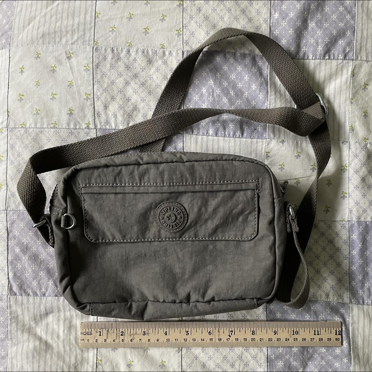 simple gray Kipling cross body bag with adjustable... Depop