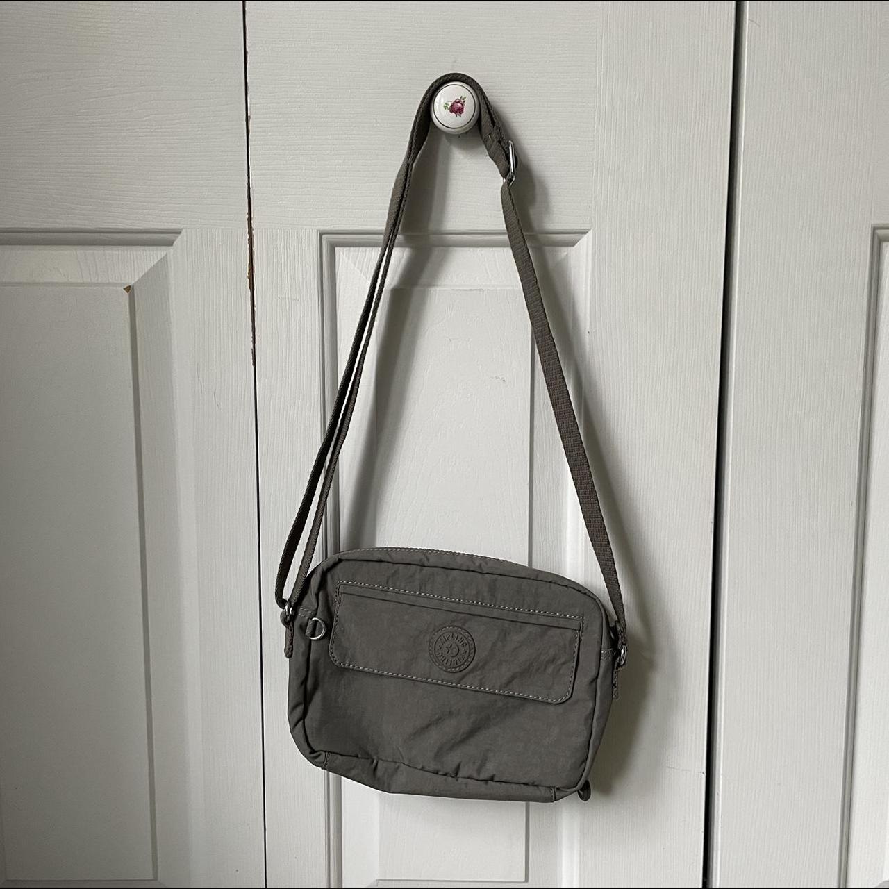 simple gray Kipling cross body bag with adjustable... Depop