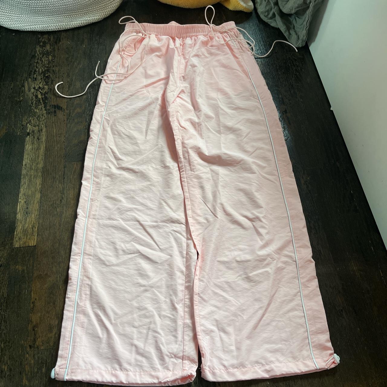 Baby pink parachute track pants with bow drawstrings... - Depop