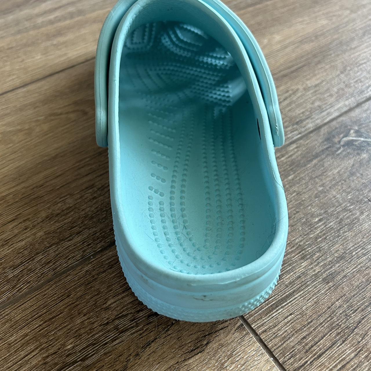 teal crocs womens