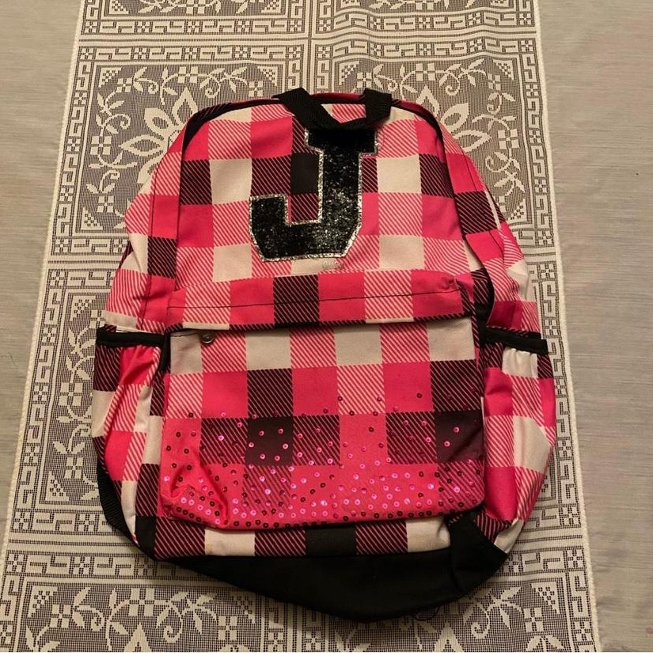 Pink and black plaid backpack with sequin detail on. Depop