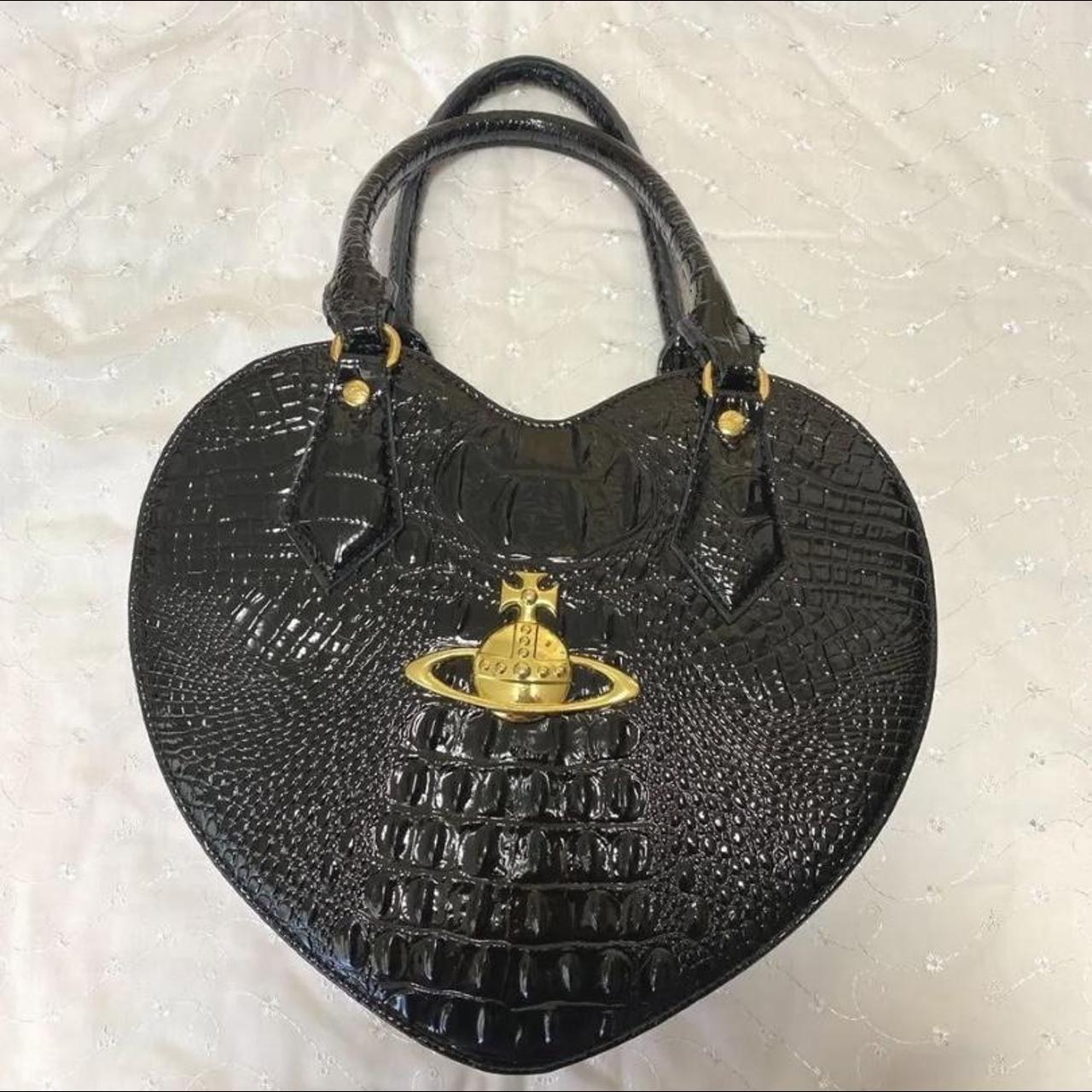 Vivienne Westwood Women's Black and Gold Bag Depop