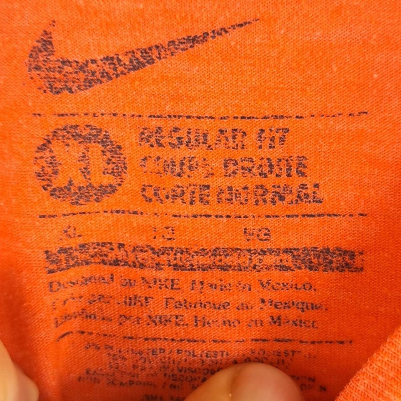 Orange Nike Dri-Fit Orioles t-shirt. The size is an - Depop