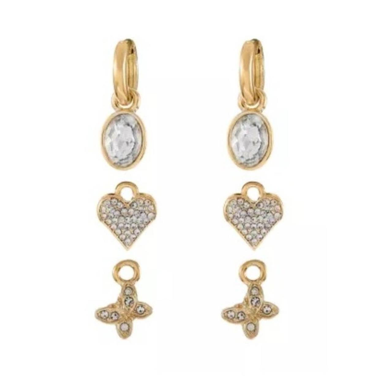 Made from polished goldtone metal, this set... Depop