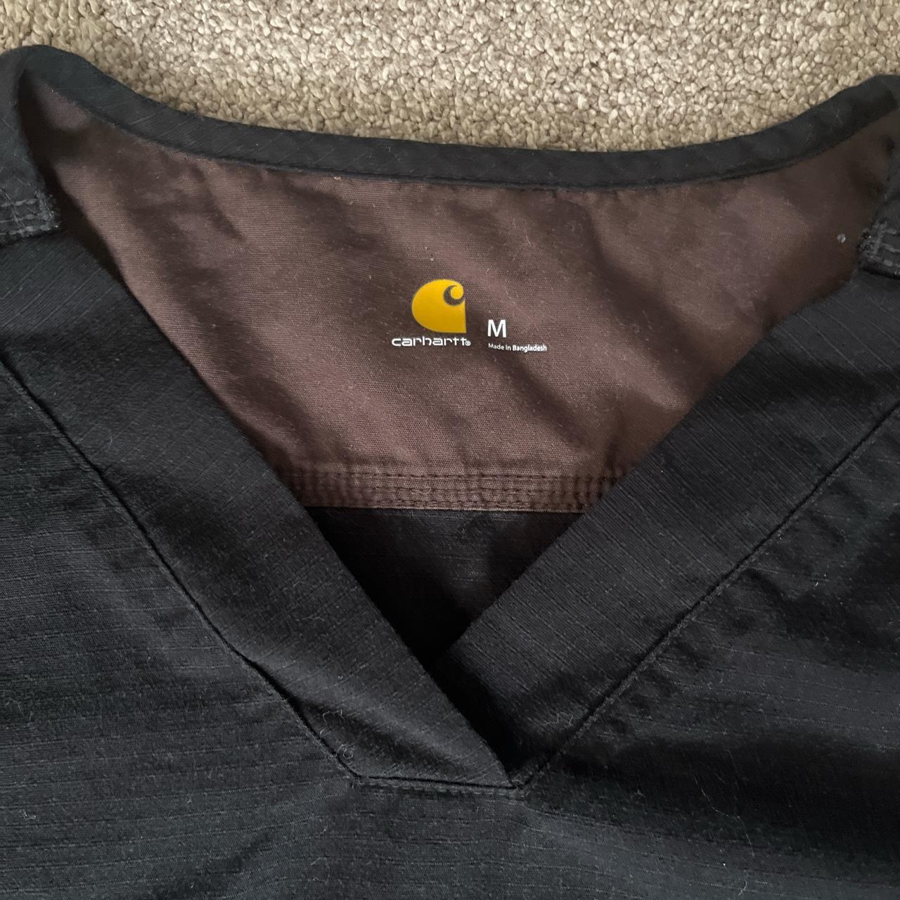 - vintage black carhartt tshirt with pocket -... - Depop