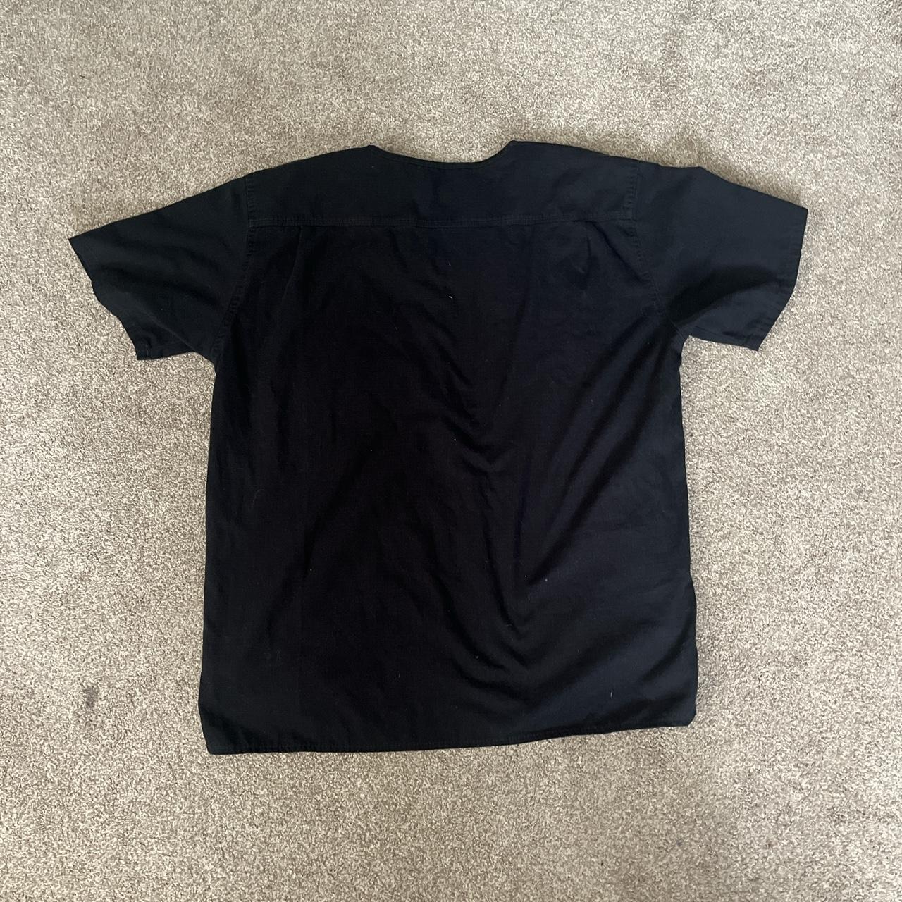 - vintage black carhartt tshirt with pocket -... - Depop