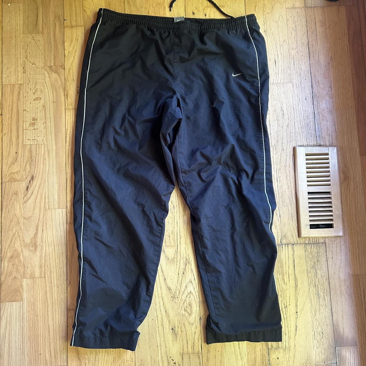 Early 2000s Nike track pants they have a couple... - Depop